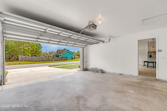 garage featuring a garage door opener