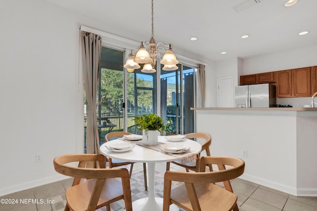 dining area featuring light tile patterned floors, baseboards, visible vents, and recessed lighting