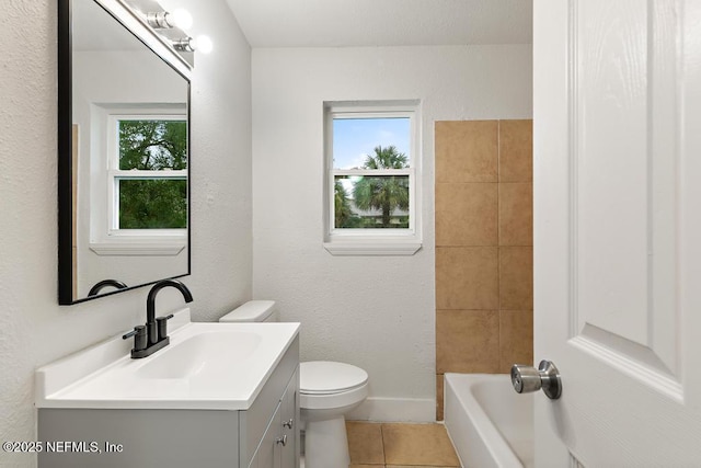 full bath with toilet, tile patterned flooring, and vanity