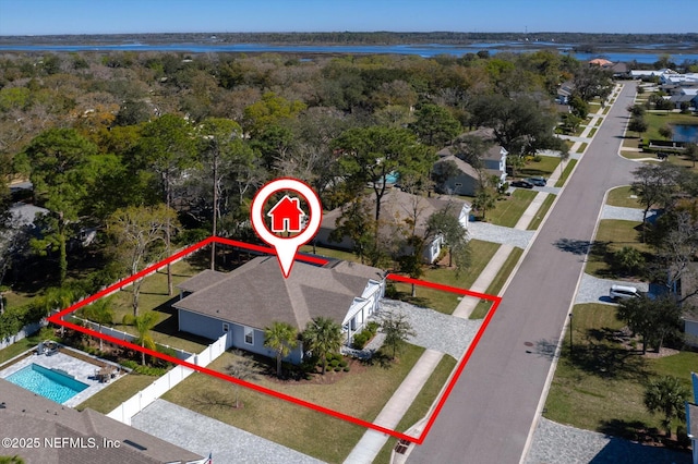 birds eye view of property featuring a water view