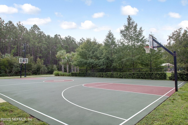 view of sport court with community basketball court and fence