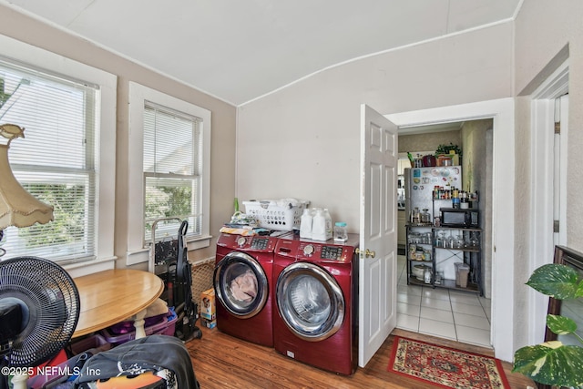 clothes washing area with laundry area and separate washer and dryer