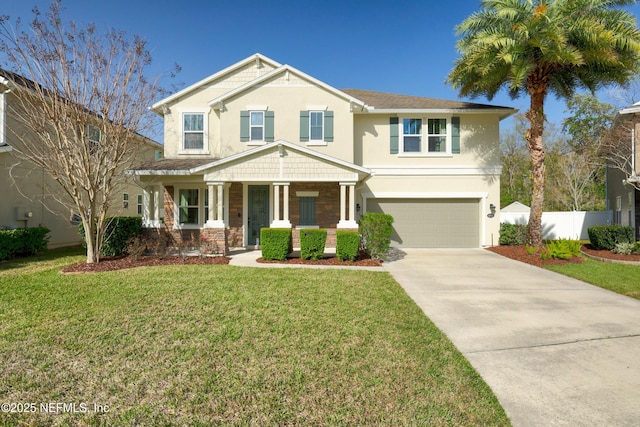 view of front of house featuring fence, a front yard, stucco siding, a garage, and driveway