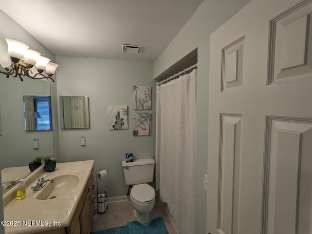 bathroom with a chandelier, toilet, visible vents, vanity, and baseboards