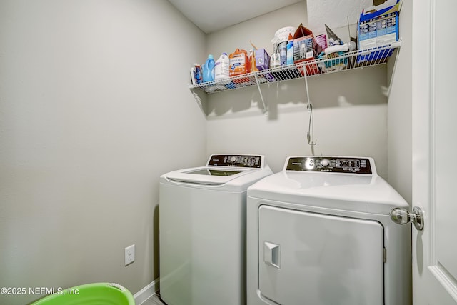 laundry area featuring washer and dryer and laundry area