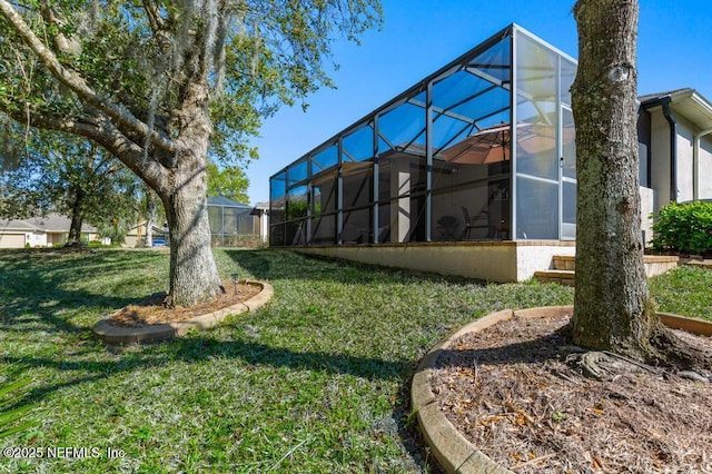 view of yard featuring a lanai