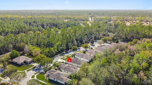 bird's eye view with a residential view and a view of trees