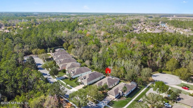 aerial view with a forest view and a residential view