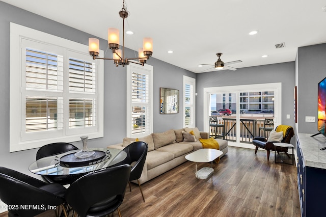 1306 1st St S, Jacksonville Beach, FL 32250 - living room with ceiling fan with notable chandelier, recessed lighting, dark wood-style floors, and visible vents