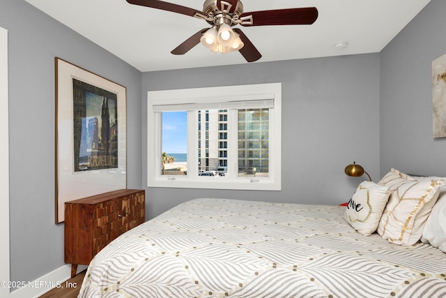 1306 1st St S, Jacksonville Beach, FL 32250 - bedroom with wood finished floors and a ceiling fan