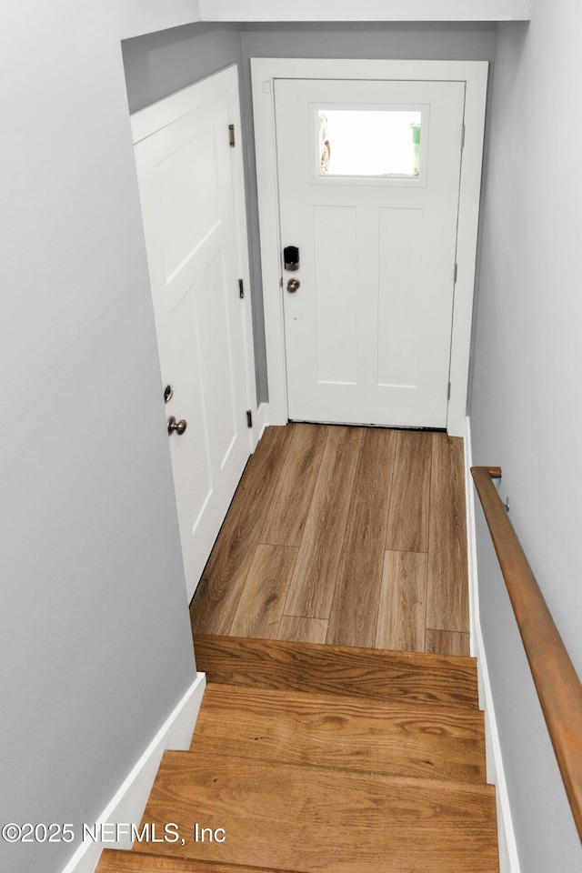 1306 1st St S, Jacksonville Beach, FL 32250 - entryway with baseboards and wood finished floors