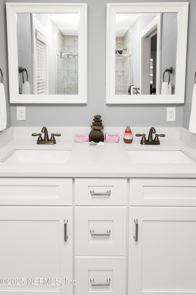 1308 1st St S, Jacksonville Beach, FL 32250 - full bath featuring double vanity, a sink, and a tile shower