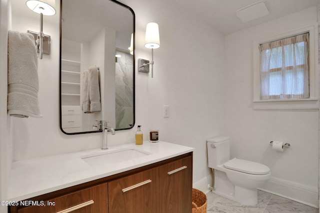 full bath with marble finish floor, baseboards, vanity, and toilet