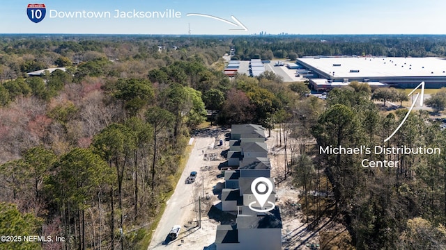 bird's eye view with a forest view