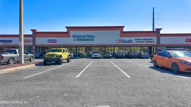 view of uncovered parking lot