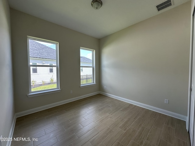 123 Tesoro Ter, Saint Augustine, FL 32095 - empty room with dark wood-type flooring