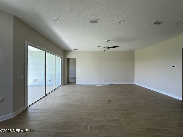123 Tesoro Ter, Saint Augustine, FL 32095 - spare room featuring a ceiling fan, a textured ceiling, dark wood finished floors, and recessed lighting