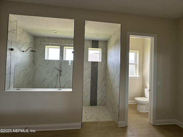 123 Tesoro Ter, Saint Augustine, FL 32095 - full bath featuring a marble finish shower and a textured ceiling