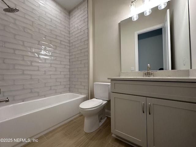 123 Tesoro Ter, Saint Augustine, FL 32095 - bathroom featuring vanity, shower / bathtub combination, and wood finished floors
