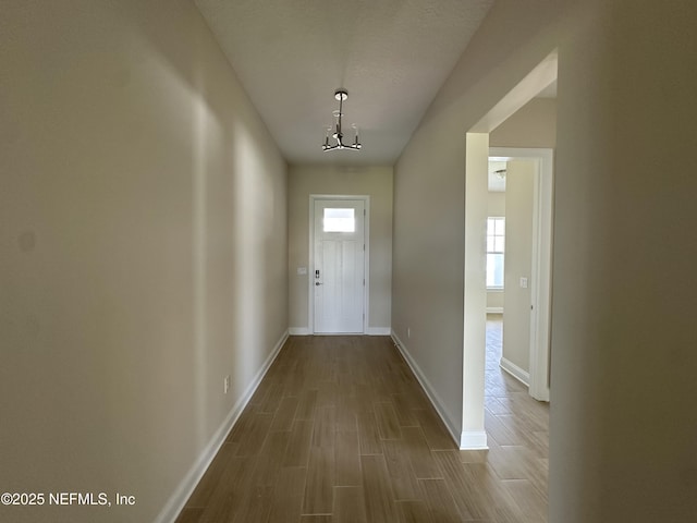 123 Tesoro Ter, Saint Augustine, FL 32095 - entryway featuring wood finished floors and a chandelier