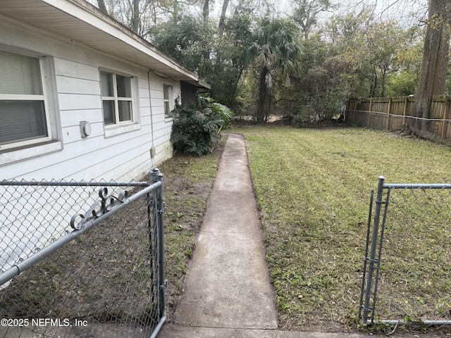 view of yard featuring fence