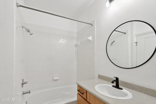 full bath featuring vanity and tub / shower combination