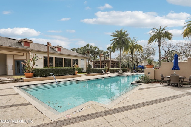 pool featuring a patio