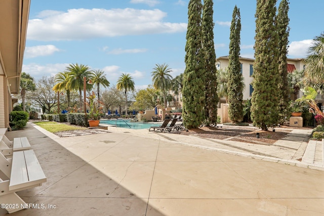 pool with a patio area