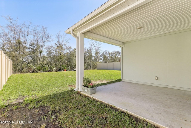 view of yard with a fenced backyard and a patio