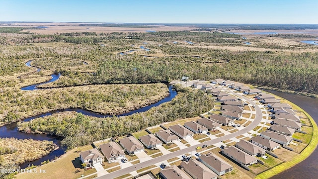 aerial view featuring a water view and a residential view