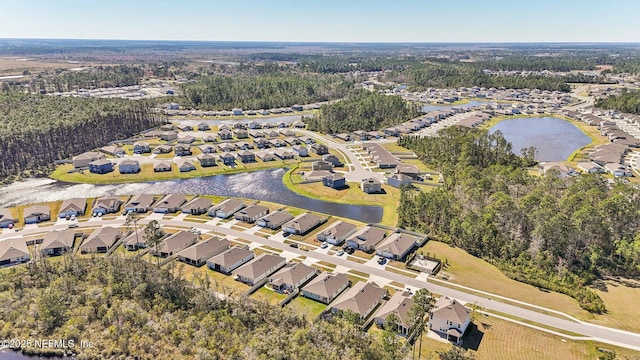 aerial view with a water view and a residential view