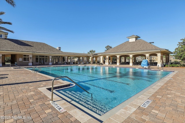 pool with a patio area