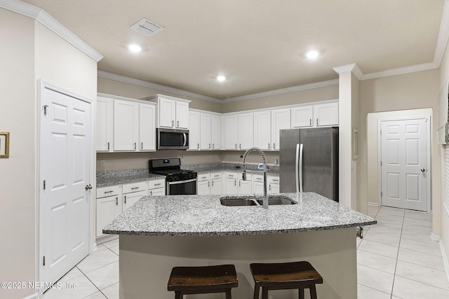 439 Coastline Way, Saint Augustine, FL 32092 - kitchen featuring light tile patterned floors, appliances with stainless steel finishes, a sink, and visible vents