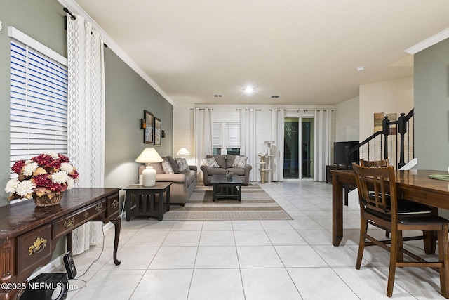 439 Coastline Way, Saint Augustine, FL 32092 - living area featuring stairs, crown molding, and light tile patterned floors