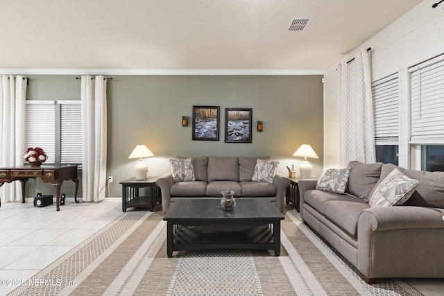 439 Coastline Way, Saint Augustine, FL 32092 - living room featuring light tile patterned flooring and visible vents