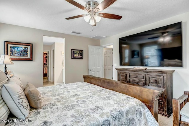 6743 Summit Vista Ct, Jacksonville, FL 32259 - carpeted bedroom with ceiling fan, visible vents, and a textured ceiling
