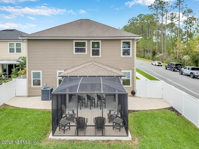 6743 Summit Vista Ct, Jacksonville, FL 32259 - back of property featuring a yard, a patio, central air condition unit, a lanai, and a fenced backyard
