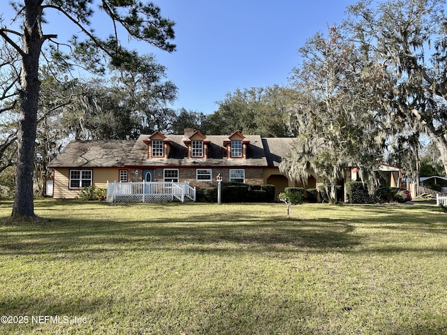 exterior space with a lawn and a wooden deck