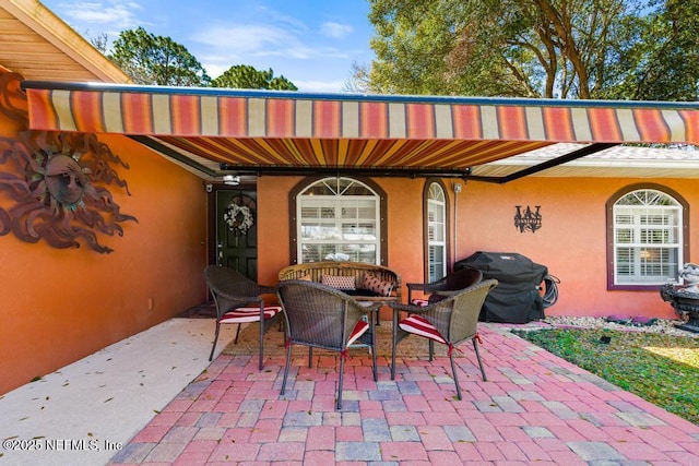 view of patio with area for grilling