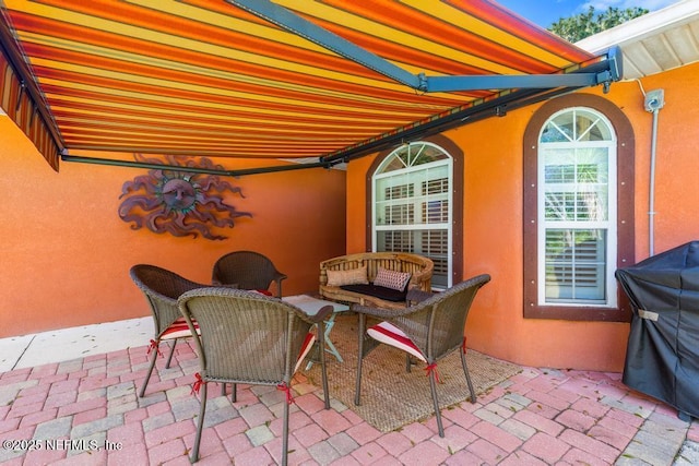 view of patio / terrace with outdoor lounge area and area for grilling