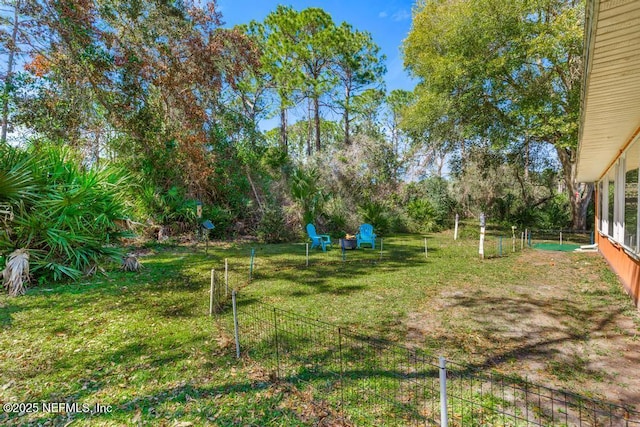 view of yard featuring fence