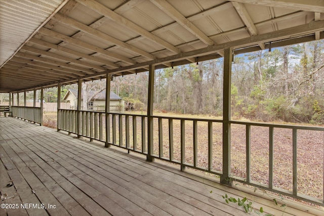 deck featuring a wooded view