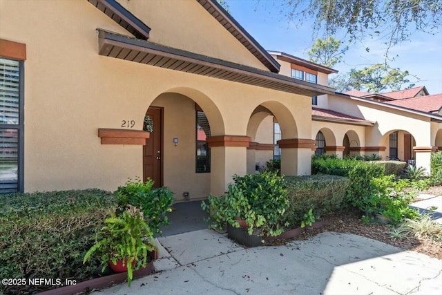 exterior space featuring stucco siding