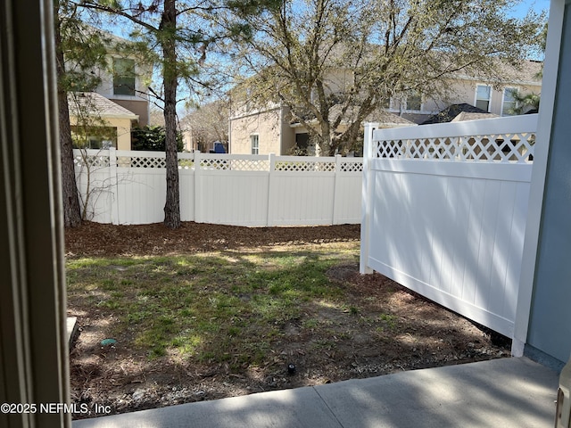 view of yard with fence