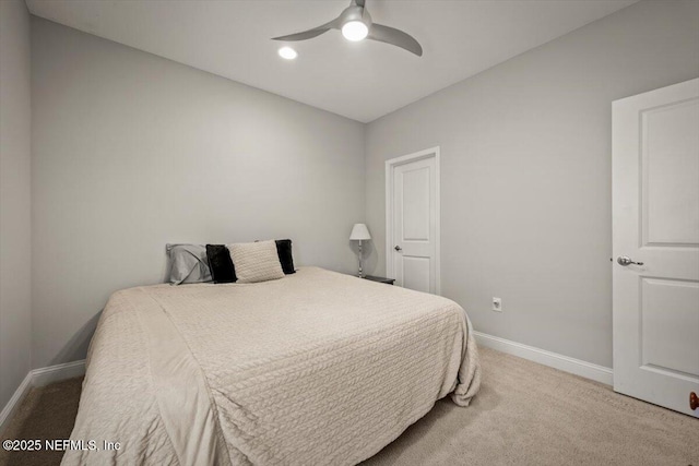 bedroom with baseboards, carpet floors, and ceiling fan