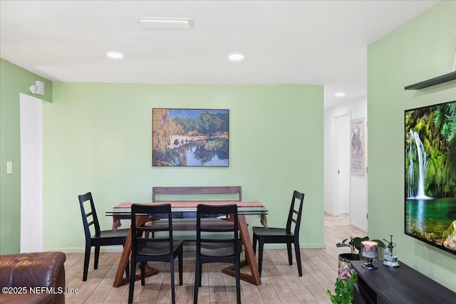 dining area with recessed lighting, visible vents, baseboards, and light wood-style flooring