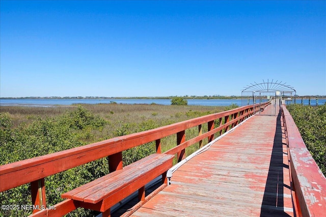 dock area featuring a water view