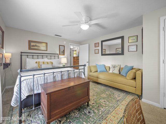 bedroom featuring carpet flooring, ceiling fan, visible vents, and baseboards