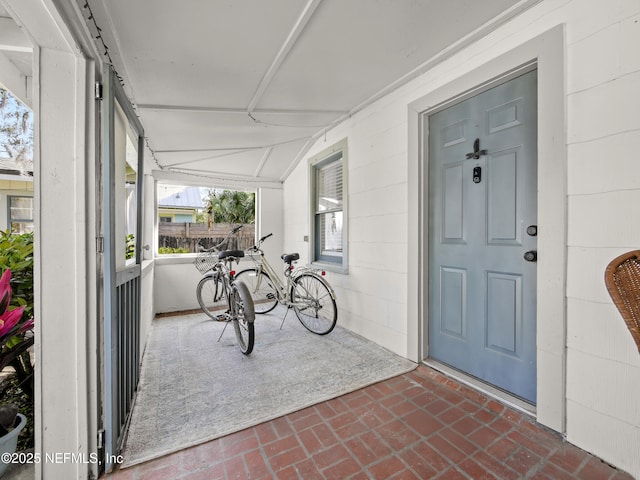 entrance to property with covered porch