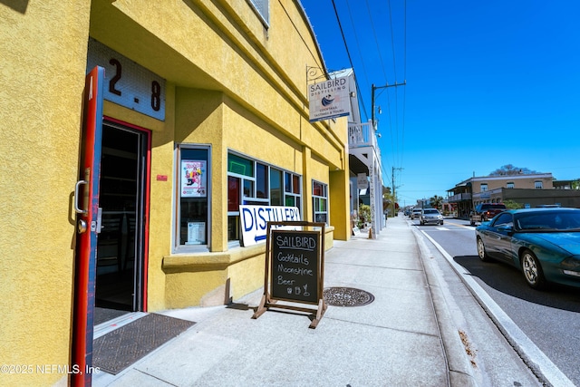 view of road featuring sidewalks and curbs